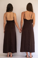 Load image into Gallery viewer, Two women wearing chocolate brown satin slip dresses holding hands against a plain background